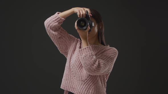 Woman using camera alt