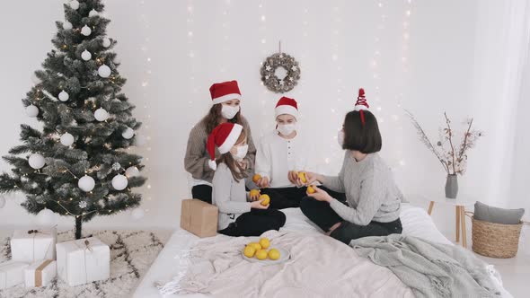 Festive Family in Party Hats and Masks Celebrating New Year alt