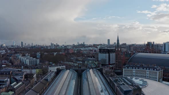 Slow drone shot looking south from Kings cross train station roof London alt