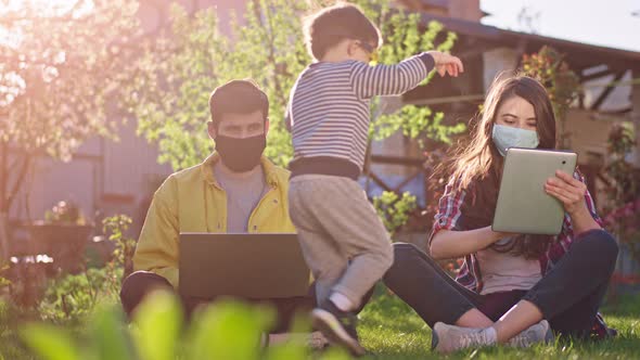 In the Garden Parents Working From Home Using alt
