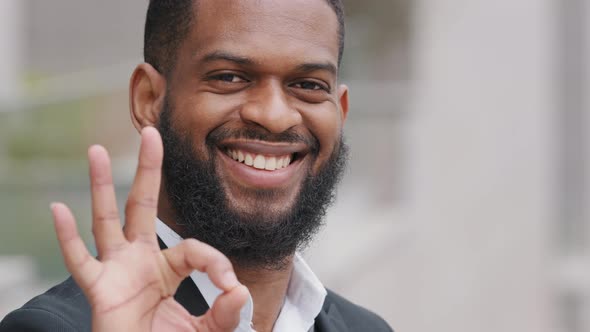 Closeup Portrait of Smiling Happy Bearded African American Black Man Wearing Suit alt