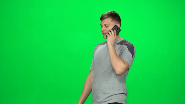 Attractive Guy Goes and Talks on the Phone, Chroma Key alt