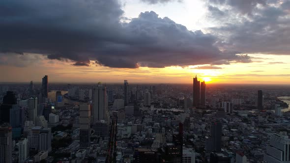 4k Aerial city view of Bangkok dowtnown, Flying over Bangkok, Thailand. alt