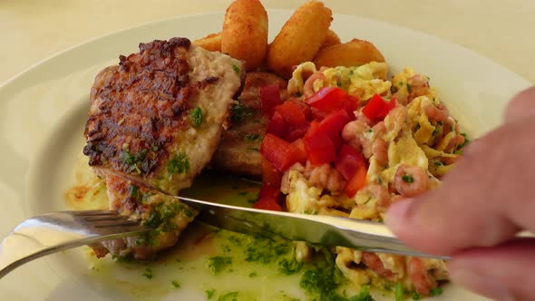 Eating steak with crab omelette and potato croquettes Personal perspective Traditional meal in North alt