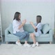 Happy Woman and Her Daughter Playing Together Patty Resting on Sofa at Home - VideoHive Item for Sale