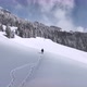 Lone Man Walking Through Snow - VideoHive Item for Sale