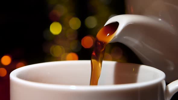 Closeup. From the Pot Poured Delicious Flavored Coffee. Slow Motion alt