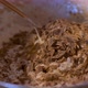 Hand Mixing Of Chocolate Dough In The Bowl - VideoHive Item for Sale