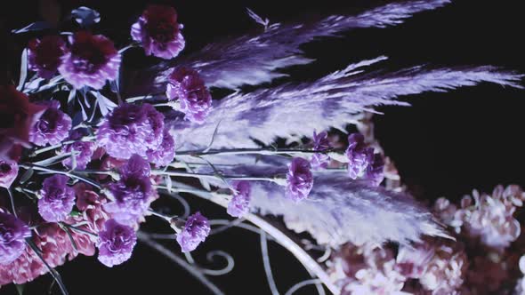 Closeup View of Wedding Floral Decorations of Flowers in Pastel Faded Colors Slow Motion Outside alt