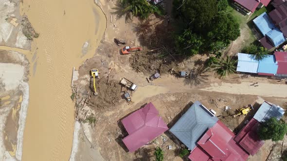 Aerial view recovery of village after flash flood alt