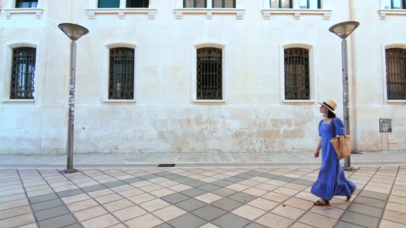 Young girl walking in Split, Croatia alt