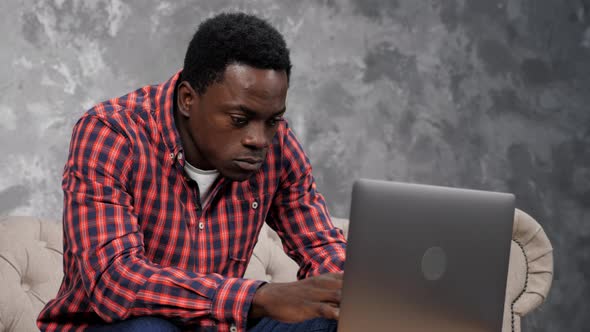 African American Man Student Study Chatting with Classmates and Shocked alt