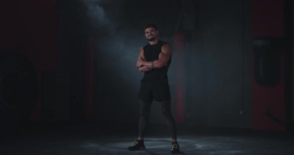 Smiling Large Athletic Guy Posing in Front of the alt