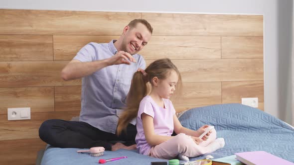 Responsible Good Father Dad Braiding Little Daughters Hair Preparations for School alt