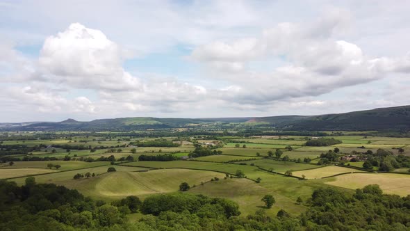 Aerial Drone Hyperlapse Over Patchwork Fields in the Yorkshire Moors alt