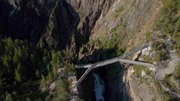 Aerial flight over new viewing bridge at precipitous Voring falls, Norway alt