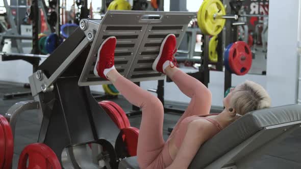 Young woman training in a sports club