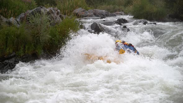 Super slow motion shot of group of people white water rafting, shot on Phantom Flex 4K