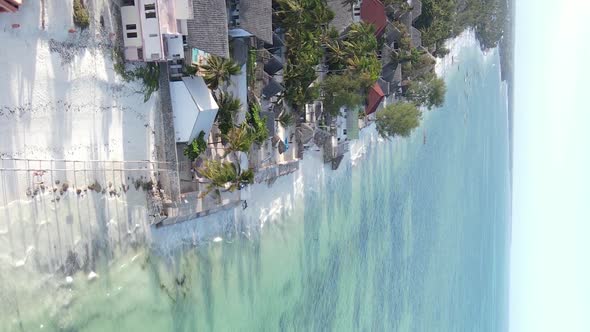 Vertical Video of the Ocean Near the Coast of Zanzibar Tanzania Aerial View alt