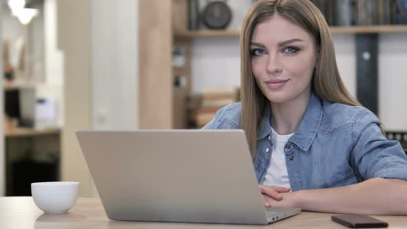 Creative Young Girl at Work Looking at Camera alt