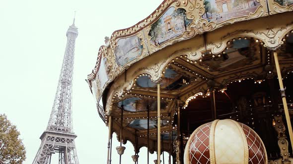 Old Fashioned French style Carousel near the Eiffel Tower in Paris, France. 4K Version.