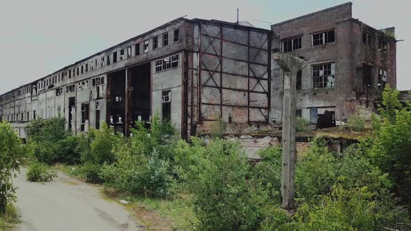 Destroyed factory after the bombing of the city of Donetsk Ukraine alt