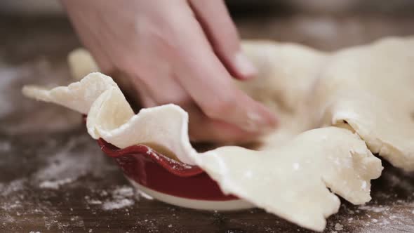 Step by step. Making pie crust from scratch to bake pumpkin pie. alt