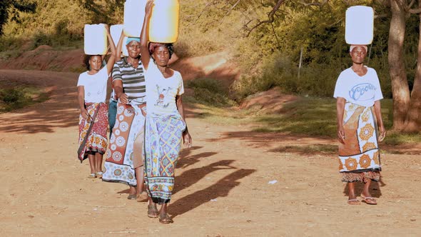 African Hard Life, Carrying Water in Barrel alt