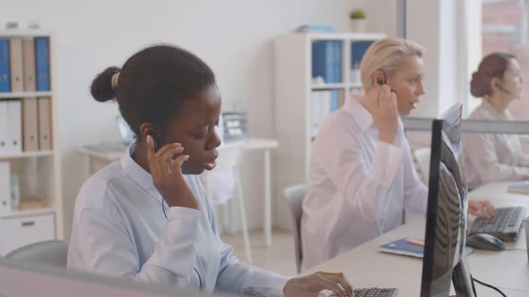 Diverse Helpline Receptionists Working Together alt
