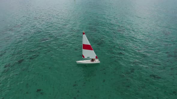 Aerial Shooting of a Sailing Yacht in the Sea alt