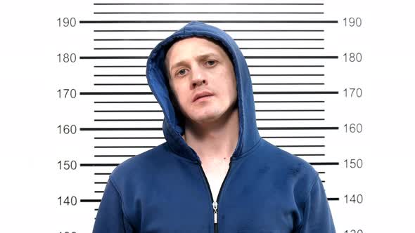 Mugshot Young Guy in the Police Station alt