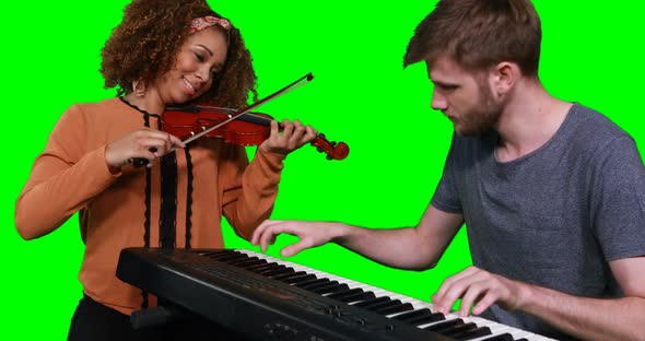 Musicians playing piano and violin alt