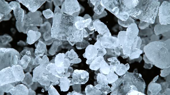 Super Slow Motion Shot of Exploding Crushed Ice Towards Camera at 1000Fps. alt