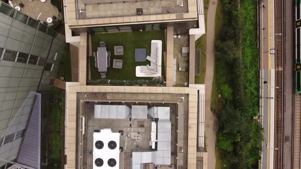 View From a Drone on the Roof of Multistorey Buildings Near the Railway Tracks