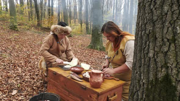 Viking women preparing food alt