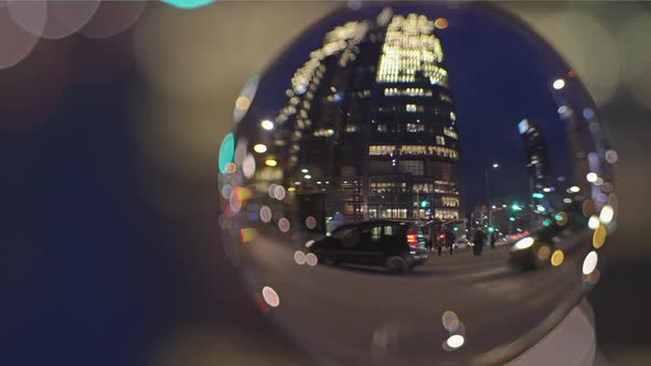 Road Traffic and People Crossing the Street in the Evening alt