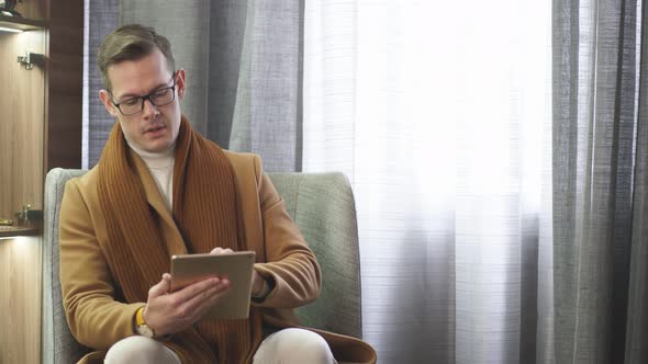 Entrepreneur Man Use Digital Tablet Sitting in Office