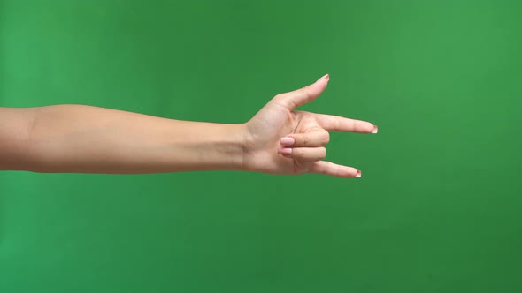 Love Woman Hand Sign Isolated On Green Screen Background alt