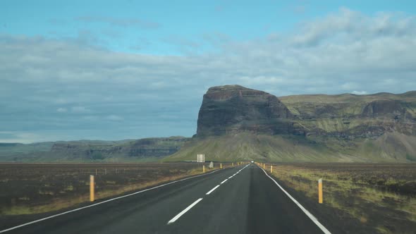 Car Driving on the Road To Iceland alt