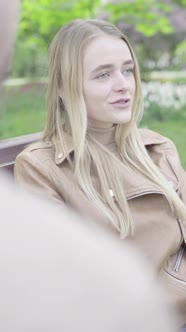 Vertical Video of a Young Skinny Girl in the Park alt