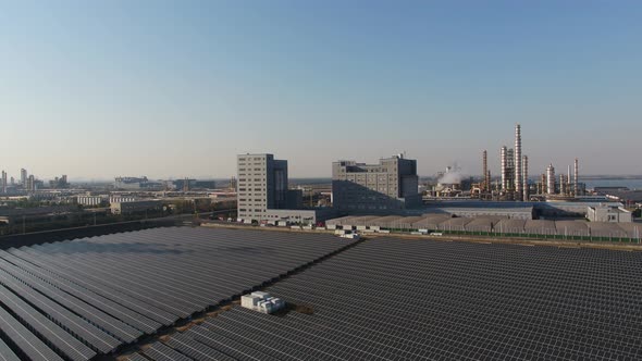 Solar power station on factory rooftop alt
