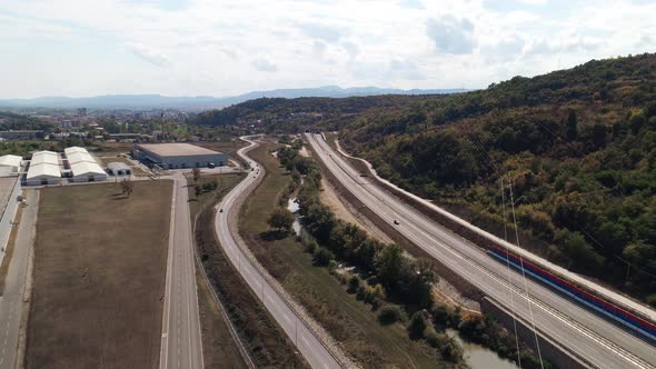 Highway motorway in Pirot, Serbia. Low flying aerial drone shot
