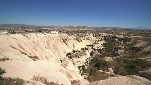 Limestone Hoodoos and Sedimentary Fairy Chimneys in an Arid Drainage Basin Valley, Cappadocia Turkey alt
