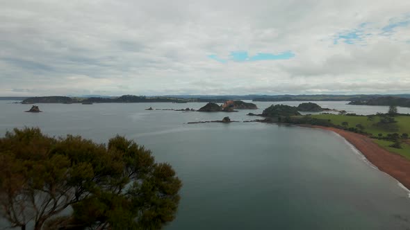 Aerial View Of Rangihoua Bay With Overcast At Purerua Peninsula In Bay of Islands, Northland, New Ze alt