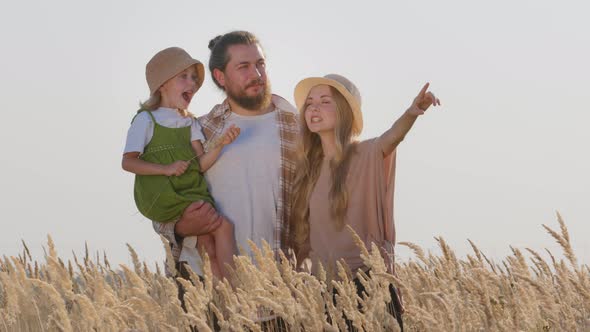 Happy Caucasian Family Parents with Small Daughter Bearded Man and Blonde Woman Father Mother and alt