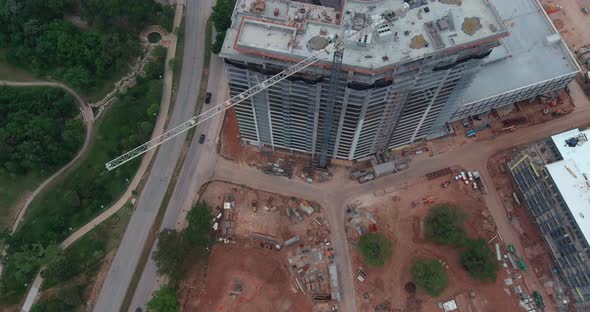 Aerial over building being constructed in Houston, Texas alt