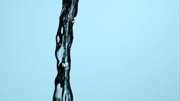 Water pouring and splashing in ultra slow motion 1500fps on a reflective surface - WATER POURS  alt