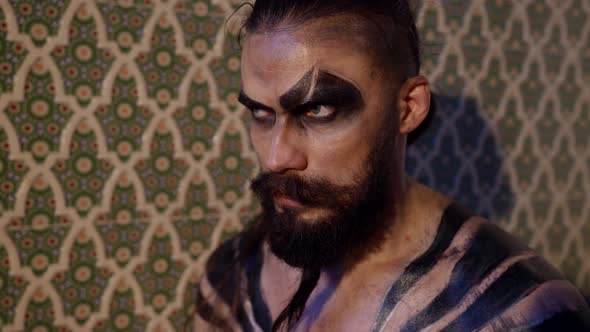 Brutal and Wild Face Art on Man War Paint for Muscular Male Demon alt