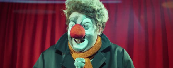 Clown Giving Stand Up on Stage alt