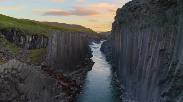 Flying Through the Studlagil Canyon in East Iceland alt